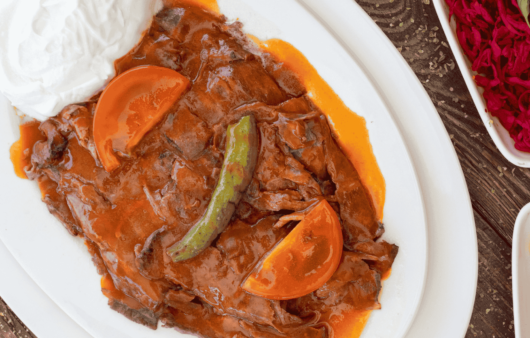 İskender Kebab (Döner Kebab with Yogurt and Tomato Sauce)