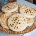 Colombian Arepa (Cornmeal Flatbread) | DelishGlobe