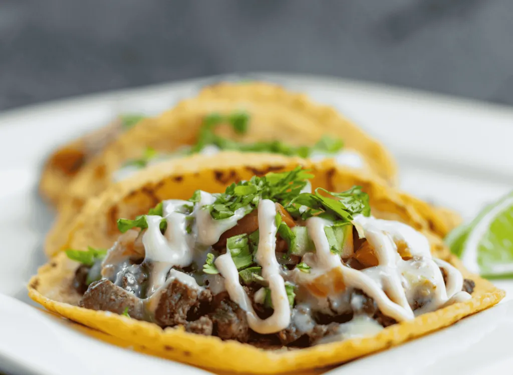 Baleadas (Flour Tortilla with Beans and Toppings)