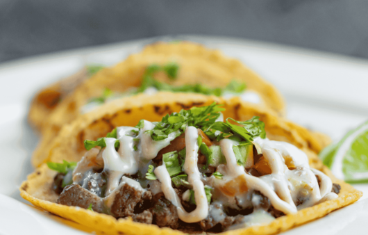 Baleadas (Flour Tortilla with Beans and Toppings)