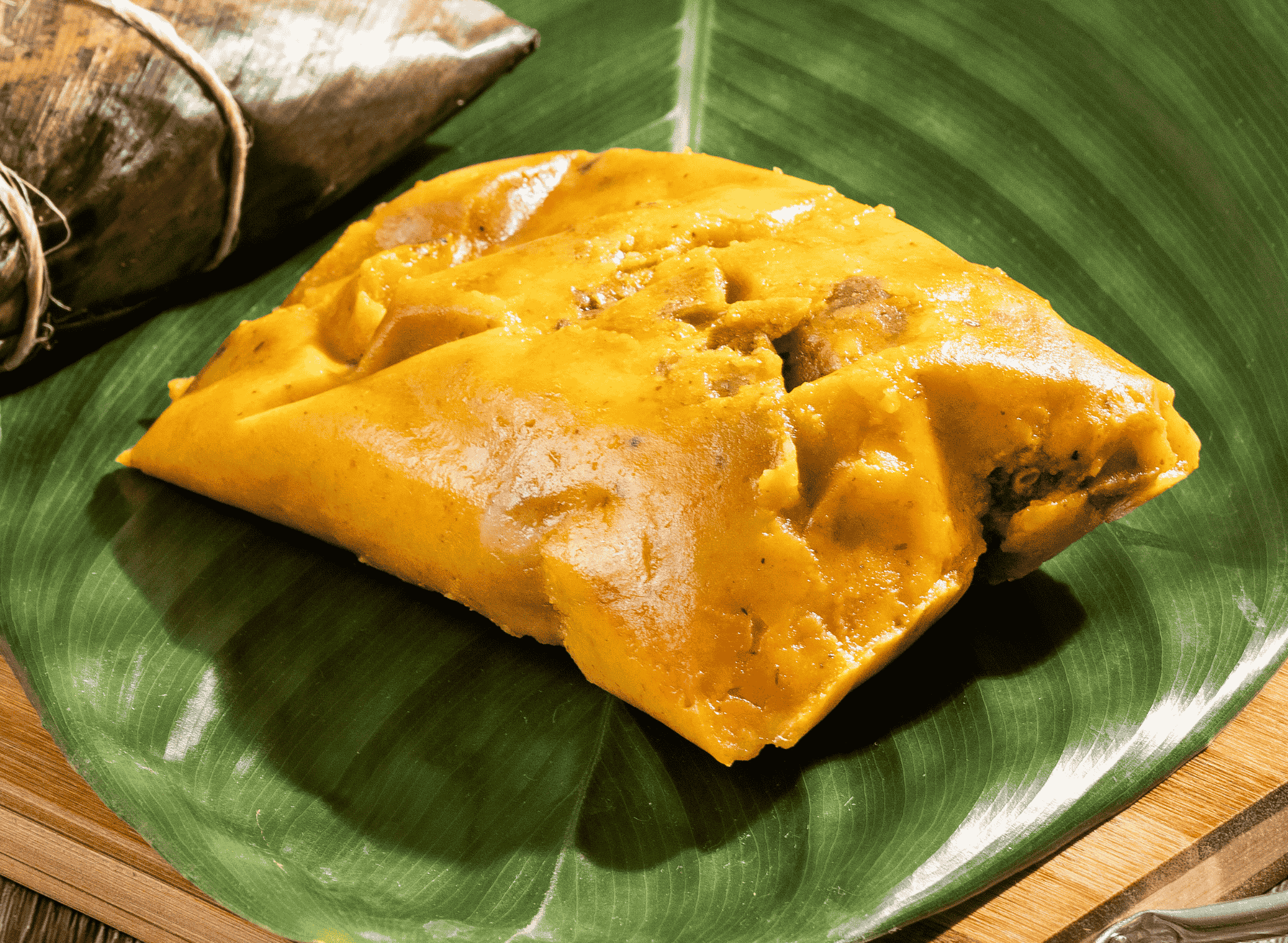 Tamal Tolimense (Stuffed Corn Dough)